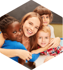 Female computer science teacher with young students